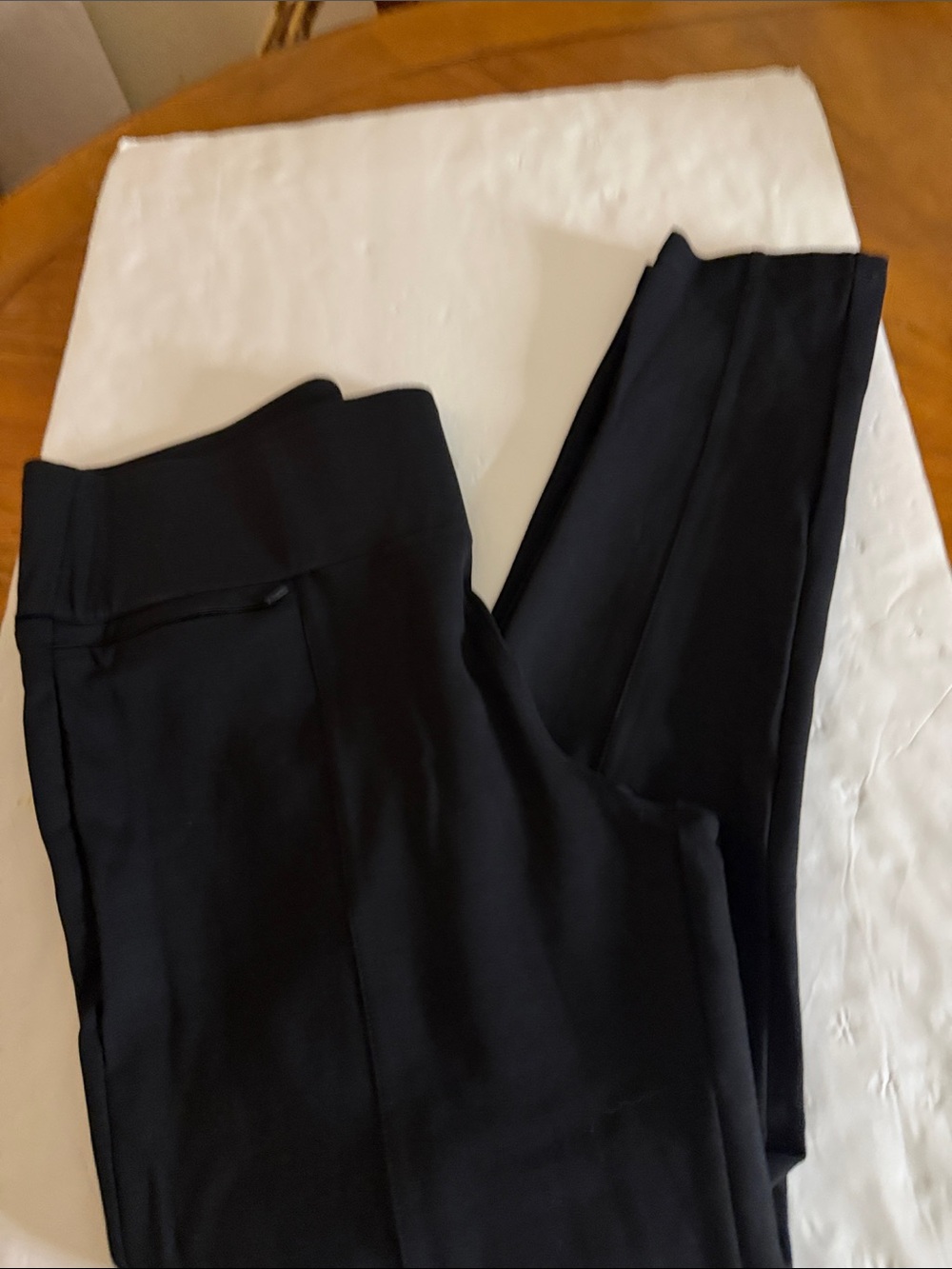 Betabrand Black pants  with front zippered and back pockets  and logo